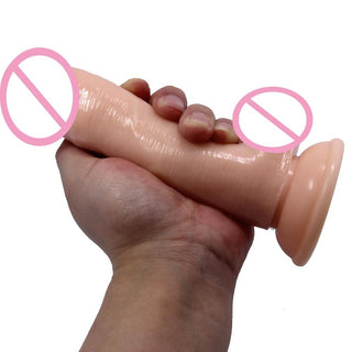 Presenting an image of a squishy dildo designed for kama sutra practice, featuring a prominent head and sculpted veins for intense stimulation.