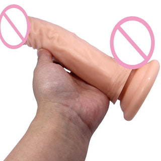 What you see is an image of a flesh-colored 6 inch dildo with balls and a strong suction cup base for stability during use.