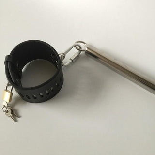Sensual exploration with the stainless steel stockade, silicone leg cuffs, and realistic dildo of the Sex Slave Torture Stockade Pillory Strap.