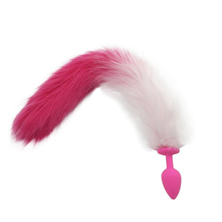 Vibrant and colorful cat tail plug with a silicone teardrop plug and a soft faux fur handle.