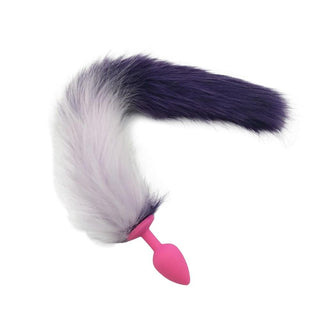 Feast your eyes on an image of a long-tailed plug made of silicone in pink color with a faux fur tail.