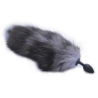 Observe an image of Gray Fox Tail Plug 16 Inches Long with a soft faux fur handle for a comfortable grip.