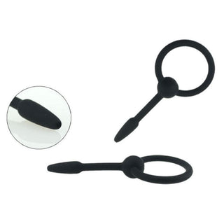 This is an image of Black Silicone Urethral Stretcher Penis Plug with a beaded design for added stimulation.