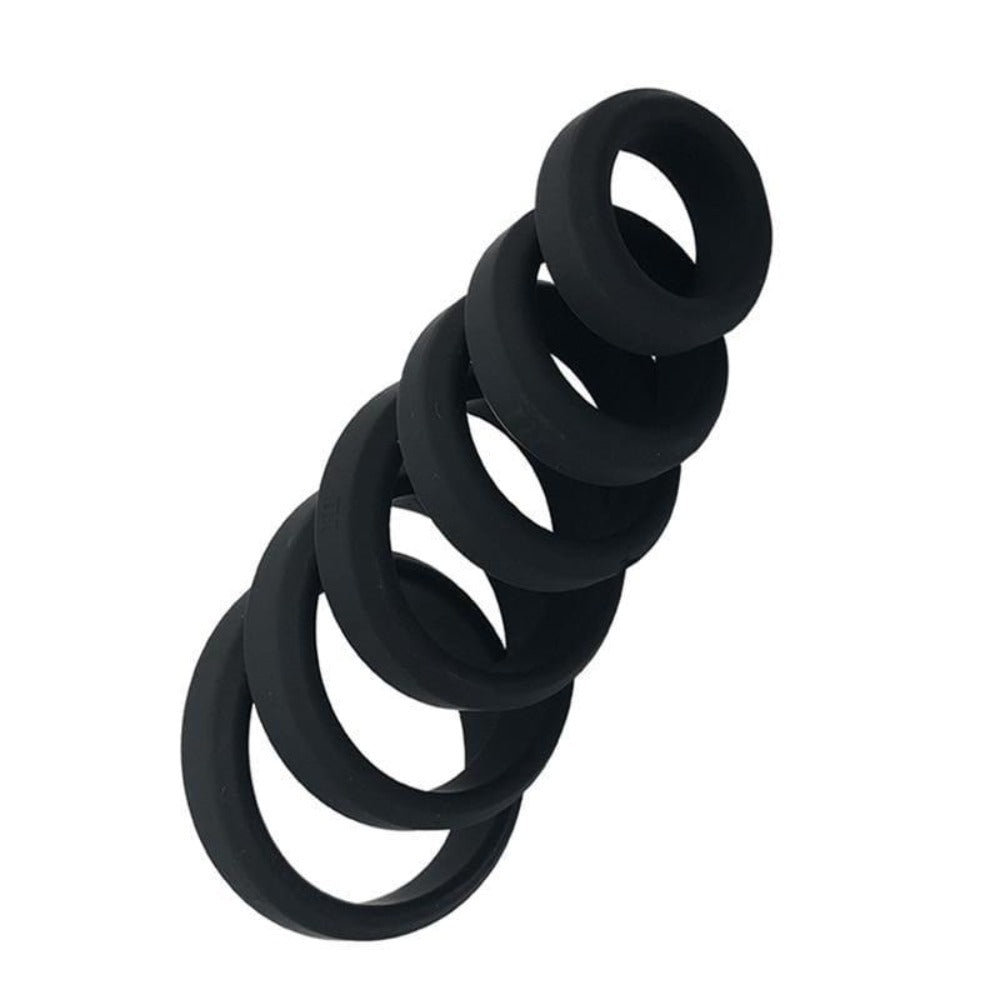 Featuring an image of Stronger Erections Black Silicone Cock Ring - Elevate Your Pleasure Game