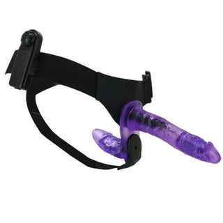 Dual-ended vibrating strap-on with large veiny dildo and smaller focused stimulator.