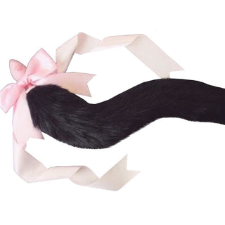 In the photograph, you can see an image of Cosplay Cat Tail Plug 13 to 15 Inches Long in white color featuring a synthetic fur tail and a slender stem for comfort.