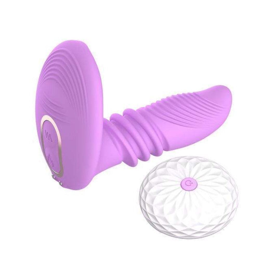 A grooved silicone thrusting vibrator dildo in purple color, perfect for intense pleasure.