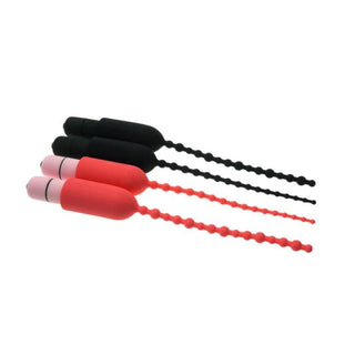 Image of Medical-Grade Silicone Urethral Penis Plug in black color with beaded shaft and vibrating feature