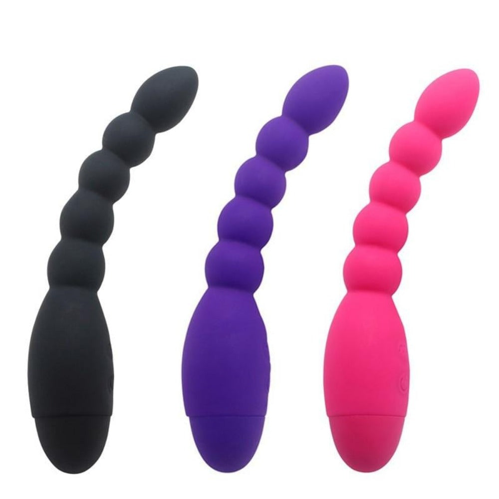 In the photograph, you can see an image of Hypoallergenic Vibrating Beads in pink, purple, and black colors made from silicone.