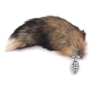 An intimate image of Faux Brown Fox Cat Fur Plug designed for pleasure, comfort, and safety.