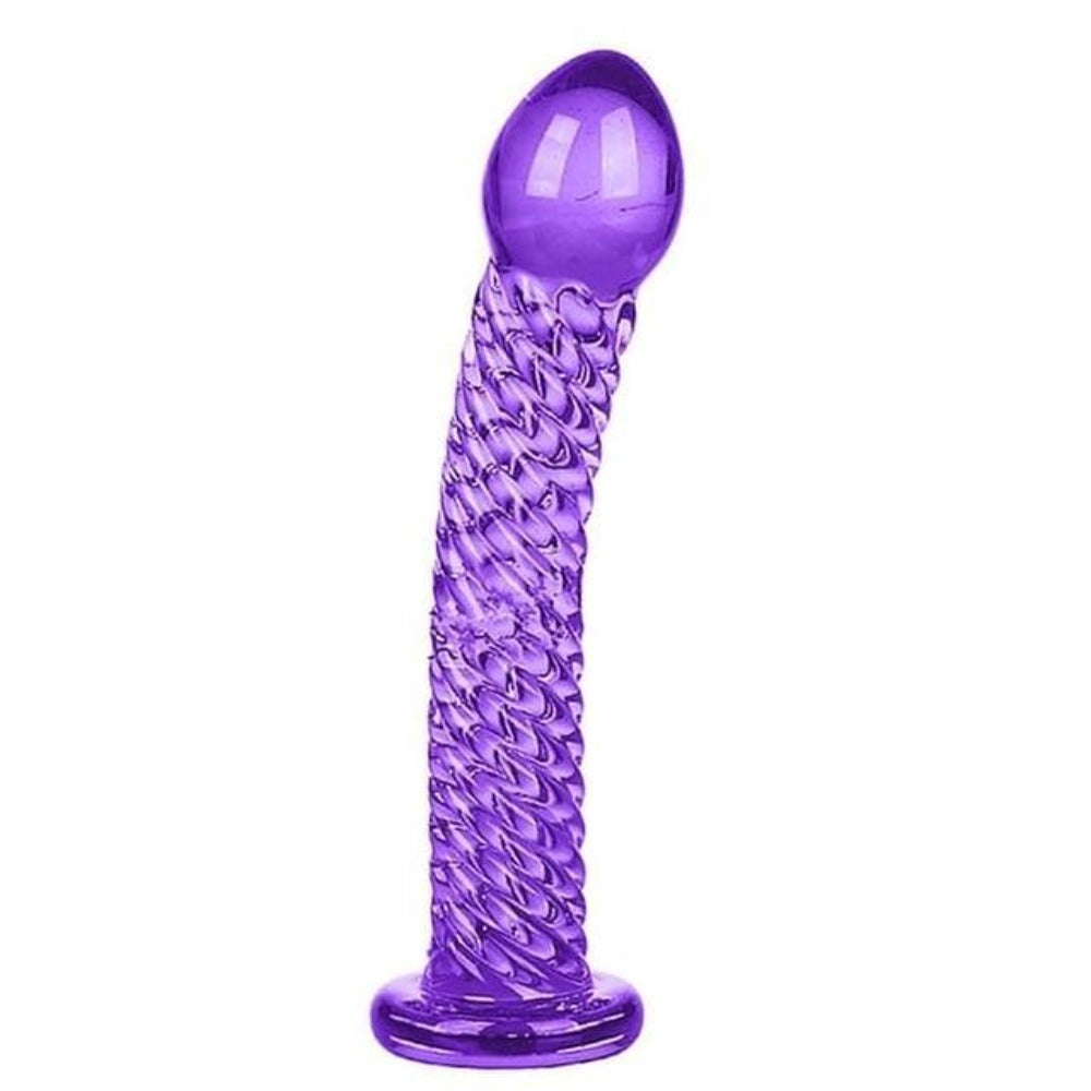 This is an image of Scaly Stimulation Colored 7 Inch Glass Dildo in green color, with a tapered tip for precise stimulation.