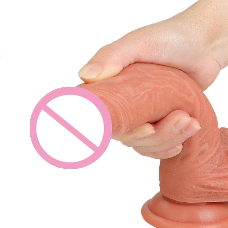 This is an image of the Happiness Provider 8 Inch Suction Cup Toy With Testicles, showcasing its realistic design to fulfill your desires.
