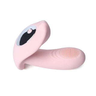In the photograph, you can see an image of silicone wearable vibrator for her in rose red color.