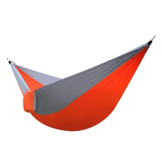 What you see is an image of a Multifunctional Outdoor Sex Hammock in orange and gray colors, made of nylon parachute material.