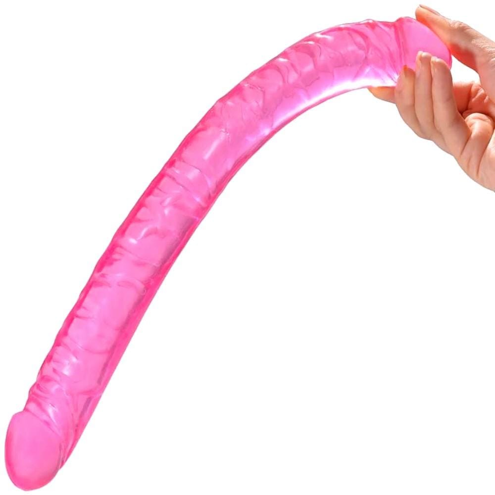 Here is an image of a long, flexible pink dildo perfect for shared penetration and reaching both vagina and anus.