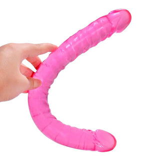 Take a look at an image of a waterproof double dildo with a smooth and firm shaft, ideal for deep stimulation of cervix or anus.