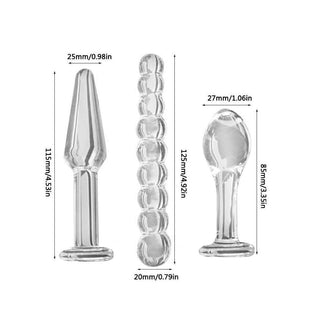 This is an image of 3 Piece Transparent Pyrex Glass Plug Anal Trainer Set For Men, a trio of plugs ready to tantalize, tease, and take you to new heights of bliss.