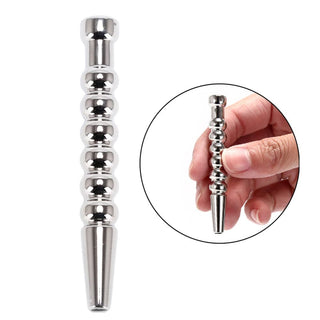 Featuring an image of Ribbed Stainless Hollow Penis Plug crafted to elevate your solo play experience.