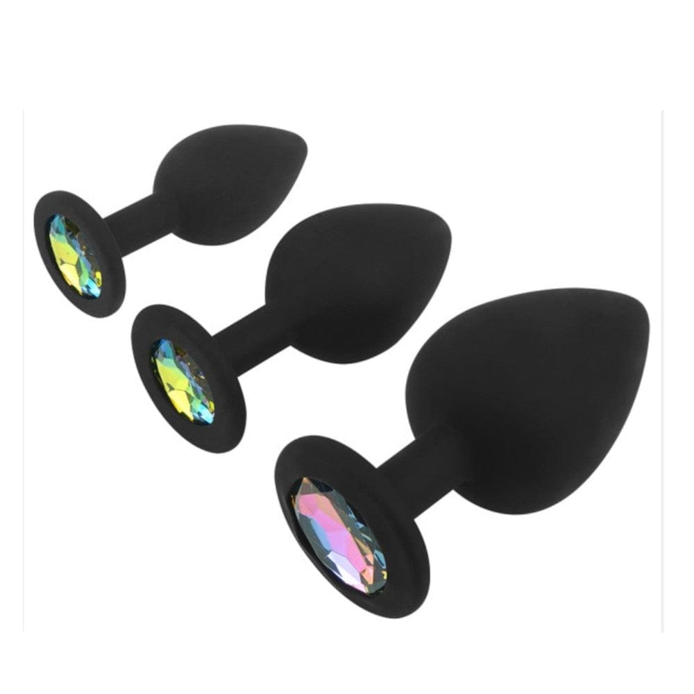 A trio of black silicone butt plugs adorned with colorful rhinestones for added elegance and flair in your intimate moments.