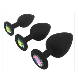 A trio of black silicone butt plugs adorned with colorful rhinestones for added elegance and flair in your intimate moments.