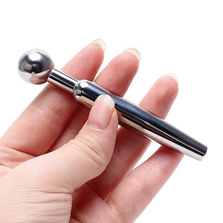 Explore the thrilling sensations of this stainless steel Hollow Prince Wand/Prince Albert Plug with a sleek and simple aesthetic.