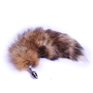 What you see is an image of 17 Frisky Stainless Steel Fox Tail, designed for role-play and intimate exploration with a soft, faux fur texture and versatile plug sizes.