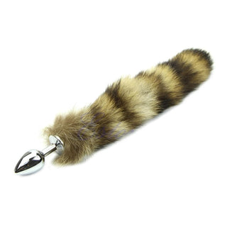 Explore the enticing blend of aesthetics and practicality in this image of Sexy Faux Steel Raccoon Tail Plug 14 Inches Long.