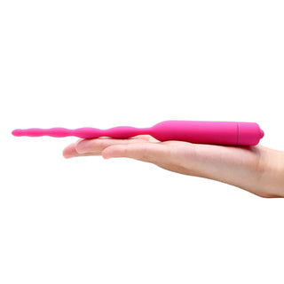 What you see is an image of Pink Vibrating Penis Plug designed for sensory pleasure and comfort.