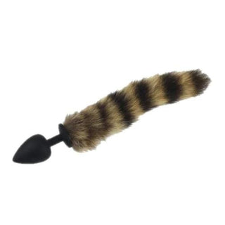 Presenting an image of Random Silicone Raccoon Tail Plug 17 Inches Long with brown and black synthetic fur handle.