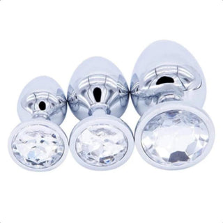 Pictured here is an image of a set of three butt plugs adorned with vibrant crystals for a touch of elegance.