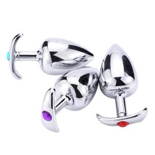 Observe an image of Anchor-Inspired Princess Metal Jeweled Butt Plug 2.76 to 3.58 Inches Long with teardrop-shaped plug and anchor-shaped handle for maximum pleasure and ease of use.