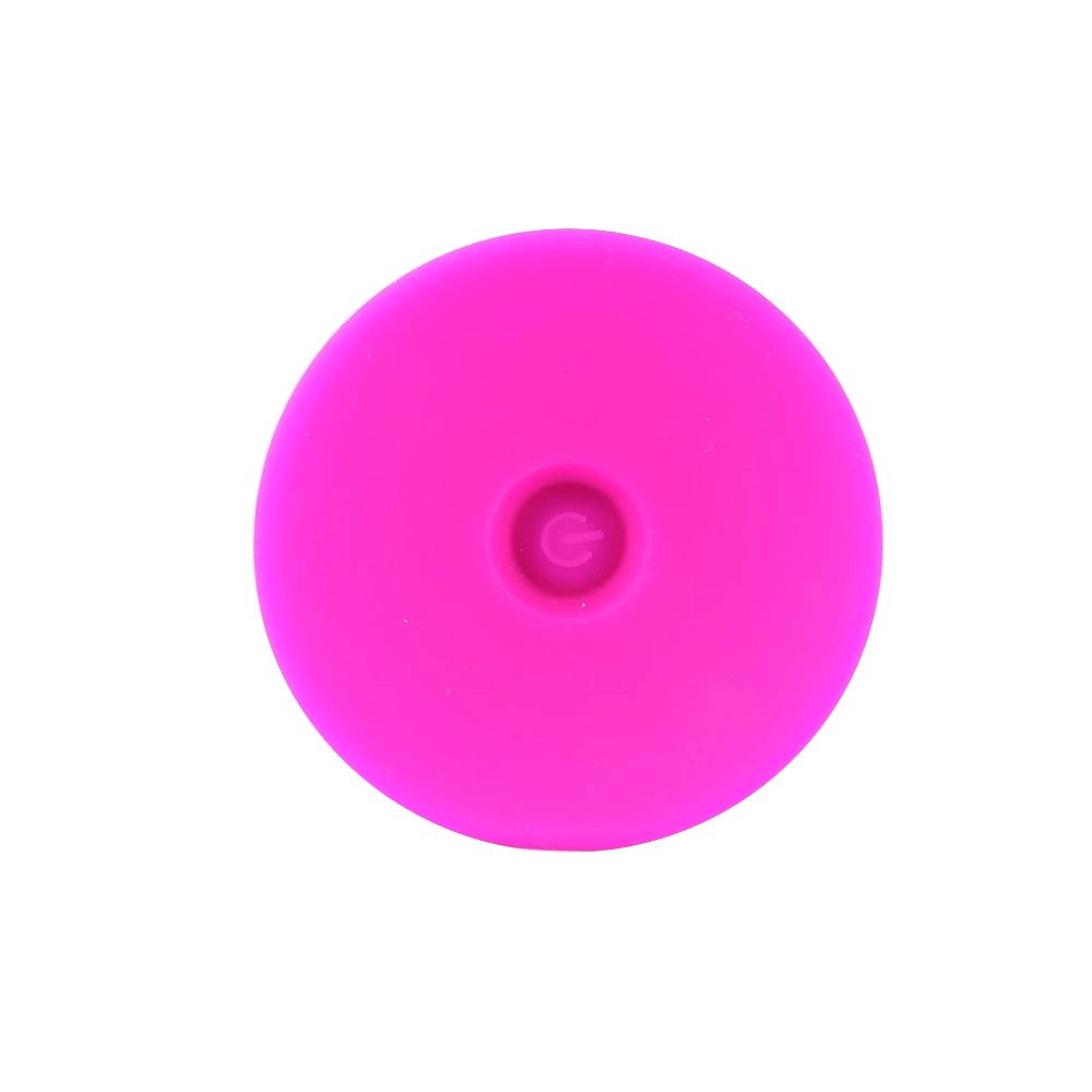 This is an image of the purple ribbed silicone suction cup butt trainer with a wide base for stability.
