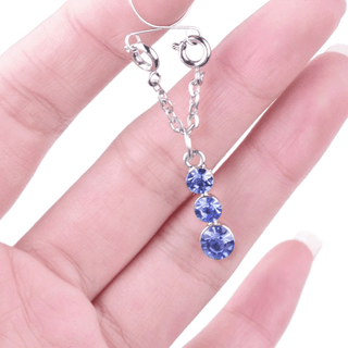 Durable stainless steel faux nipple rings with attractive blue jewels for a comfortable and stimulating wear.