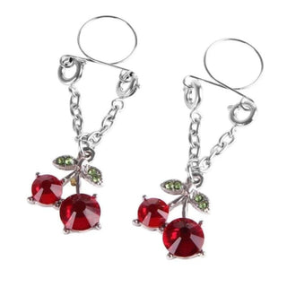 Feast your eyes on an image of Luxury Jeweled Clamps with red jewels, designed to enhance intimacy and pleasure.