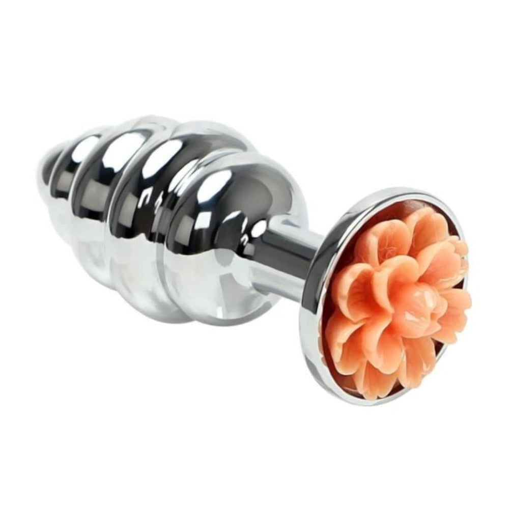 A picture of Shiny Ribbed Pretty Flower Metal Plug 2.76 Inches Long in pink color, featuring its sleek stainless steel material for comfort and durability.