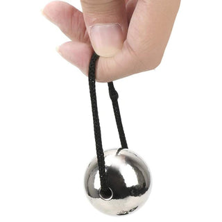 Here is an image of the silicone ring and weight ball assembly of Strength Trainer Penis Weights for stamina building.