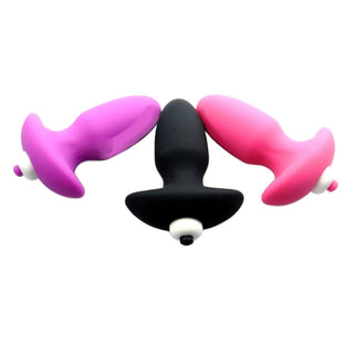 Take a look at an image of Colored Hollow Silicone Vibrating Plug in rose color, 4.13 inches long.