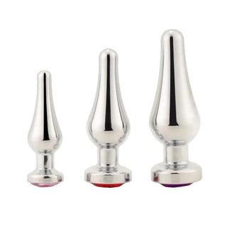 This is an image of the jewel-accented Silver Cone-Shaped Princess Jeweled 3-Piece Set Trainer Huge with varying sizes for gradual exploration of anal pleasure.