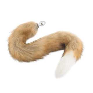 Take a look at an image of Stainless Steel Butt Plug With 32-Inch Brown and White Fox Tail, a luxurious intimate accessory for thrilling pleasure.