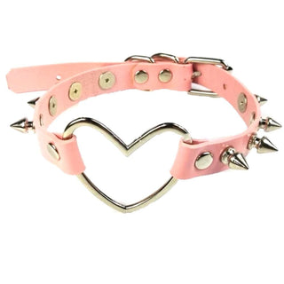 You are looking at an image of Cute Pink & Spiky Slave Collar Non-Leather, a bold and stylish accessory with vibrant pink color, spikes, and heart centerpiece.