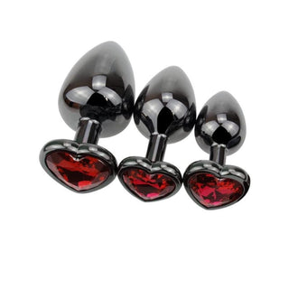 Check out an image of Red Heart Princess Metal Plug Training Kit 3pcs with glistening black finish and vibrant red jewels.