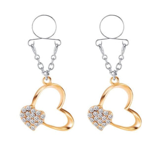 Feast your eyes on an image of Dangling Heart Clip-on Nipple Jewelry with heart-shaped ornaments encrusted with crystals.