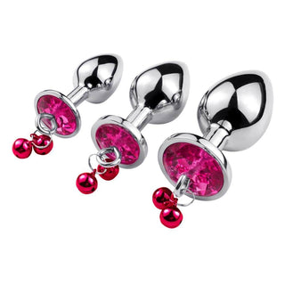 This is an image of Dangling Jeweled Bell Princess Anal Trainer Set, 3-Piece displaying plugs adorned with light blue, rosy, and mixed jewel colors for visual appeal.