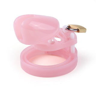 Presenting an image of the Pink Plastic Small Clitty Cage made from body-safe plastic for extended hours of comfortable wear and easy maintenance.