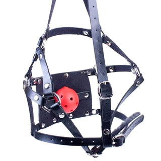 This is an image of Bondage Harness Gag showcasing its durable design with secure rings and rivets, and a red ball for complete mouth restriction.