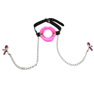 This is an image of Slave Punishment Gag With Nipple Clamps in pink color with adjustable PU leather strap.