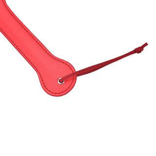 This is an image of the wrist string feature of the paddle, offering additional security for confident and controlled play.