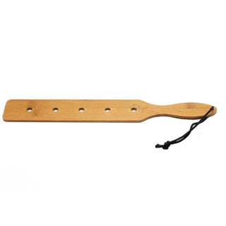 Presenting an image of BDSM paddle with strategically placed holes for intensified sensation and visual allure.