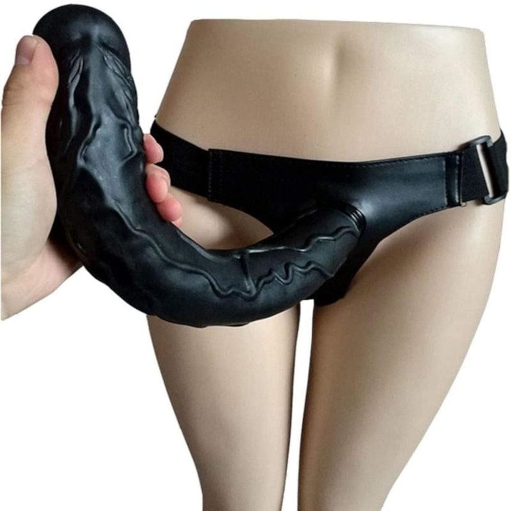 Image of a black strap on dildo with a length of 13.78 inches and a width of 1.97 inches.