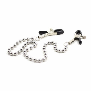 Experience unforgettable moments with Badass Clamps With Chain, a tool for exploration and excitement in intimacy.